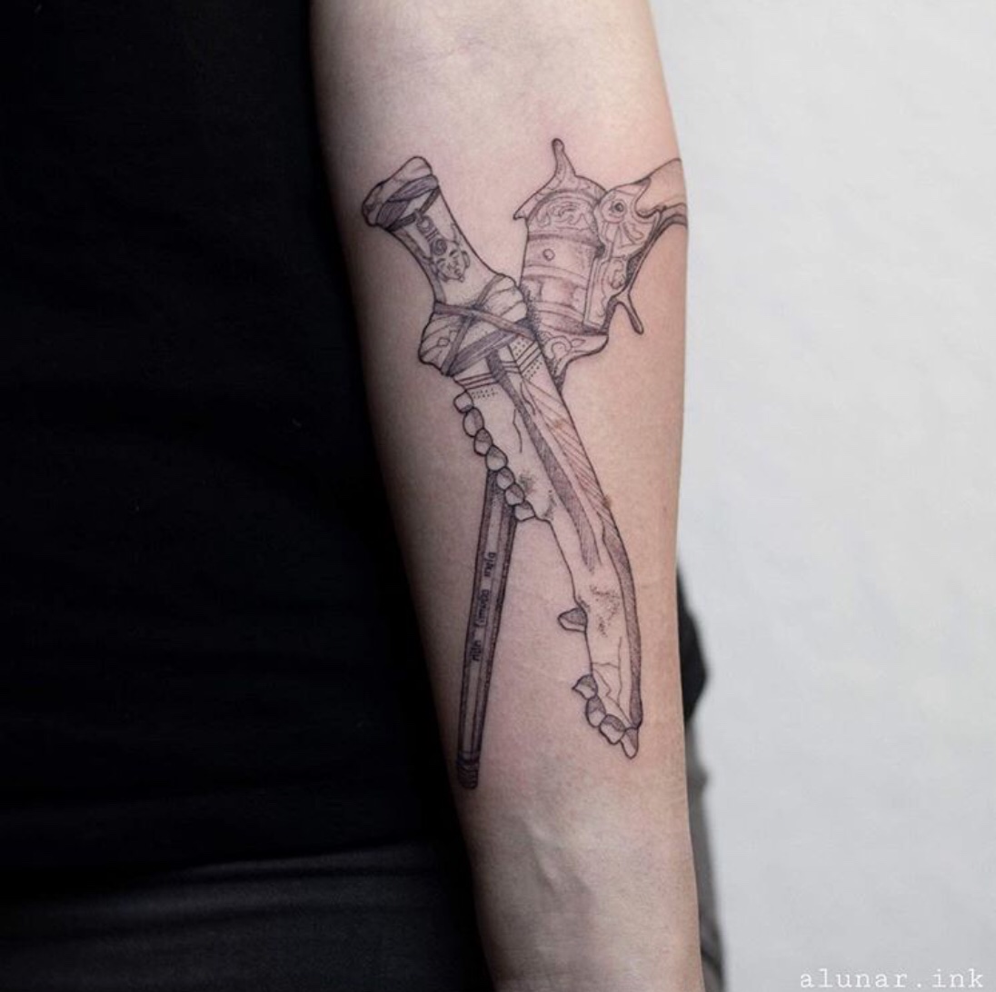 the colt and first blade tattoo
