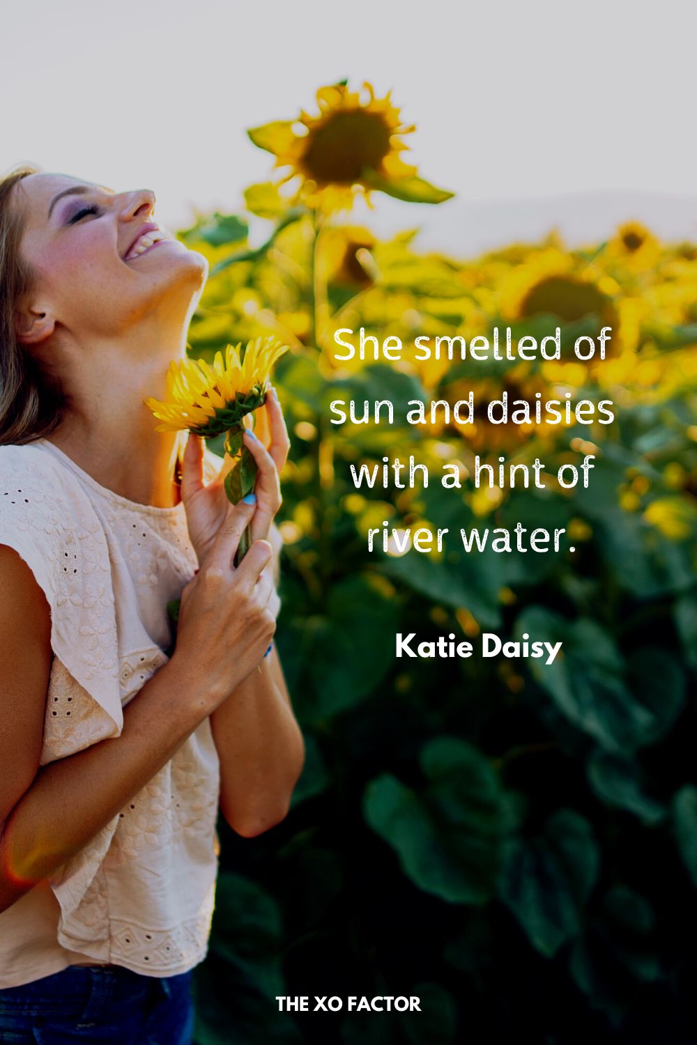 She smelled of sun and daisies with a hint of river water.